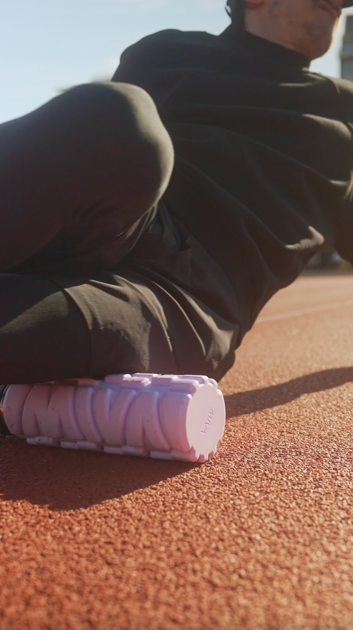 Model on a track Lavender Haze 25 oz MIVA Recovery Foam Roller Water Bottle
